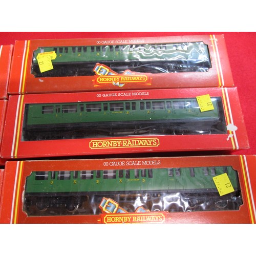 21 - A rack of Hornby SR coaches  Four  r486 Composite One r424 composite and R487 Brake 3rd