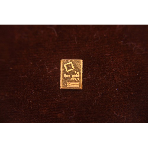 129 - A small gold ingot comprising 1g of 999.9 fineness gold, Swiss assay mark
