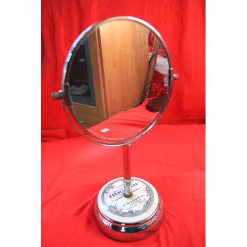 140 - An antique shaving or cosmetics mirror, the base set with an 'Eau de Lavadre' antique pot lid