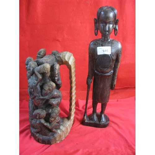 146 - A pair of vintage carved ethnic figures