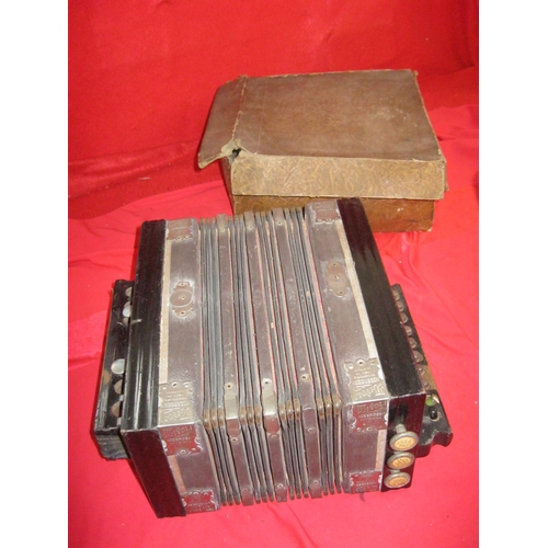 262 - An antique Tivoli Accordion in its original box, bellows good