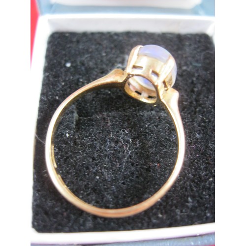 281 - A 9 carat gold ring with clear stone, the finish to the stone rather cloudy, 2.19g approx weight, si... 