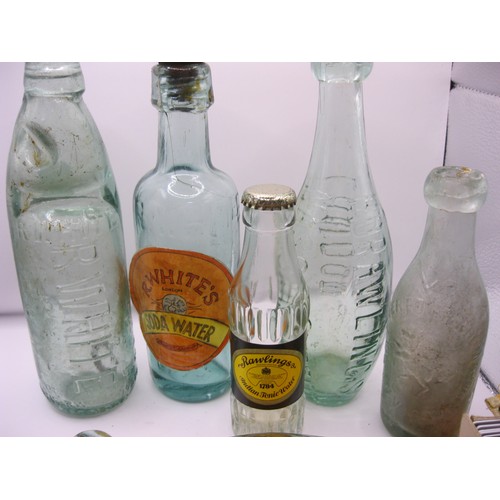 322 - Various antique bottles relating to Rawlings of London including a Codd bottle, plus a related slide... 