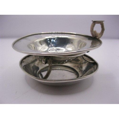 307A - A sterling silver strainer on a silver stand, hallmarked for Birmingham 1909 by William Hutton & Son... 