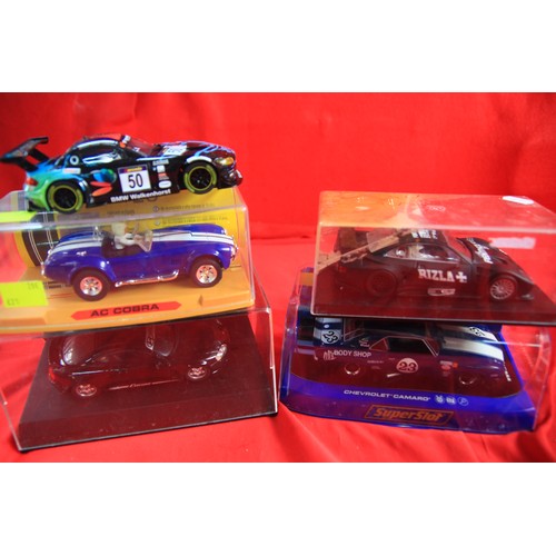 157 - Five assorted slot cars - 1:32 scale SuperSlot Chevrolet Camaro (boxed), Cartrix Hyundai Coupe Road ... 