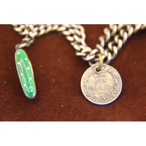 73 - A .925 sterling silver watch chain with miniature knife and 1906 Edward VII 6d attached, approx weig... 