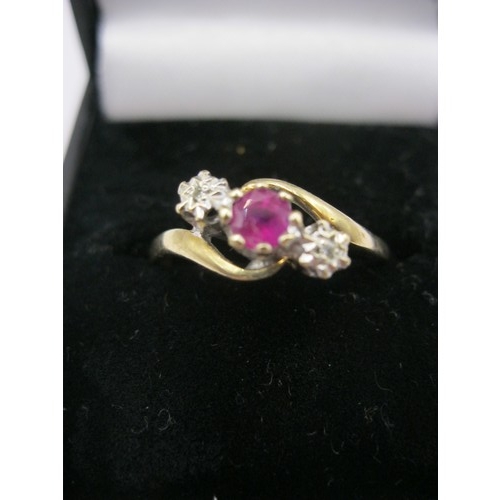 123 - A 9 carat gold ruby & diamond serpentine ring, size R, approx weight 2g