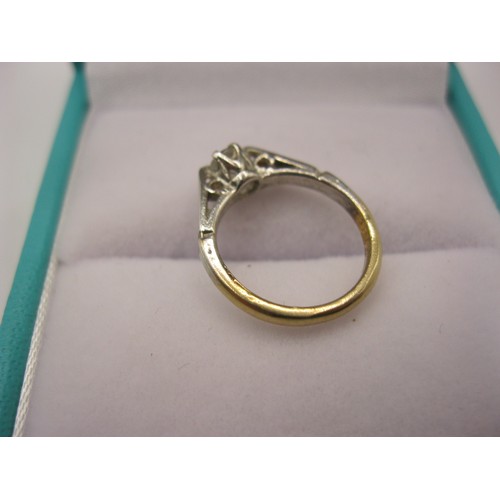 124 - An 18 carat gold solitaire diamond baby's ring, size A/B, approx weight 1g