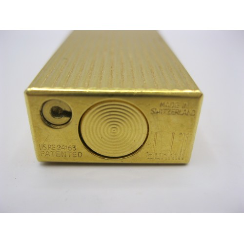 142 - A vintage gold-plated Dunhill cigarette lighter