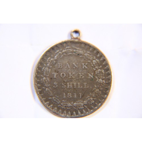 44 - An 1811 George III 3 shilling bank token, in good order but with necklace loop mounted to top
