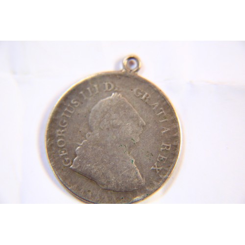 44 - An 1811 George III 3 shilling bank token, in good order but with necklace loop mounted to top