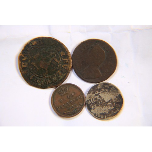 46 - An interesting assortment of coins comprising a McDeavil Token, an 1844 Victoria Half Farthing, and ... 