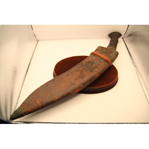 24 - A WW1 military Mark II Gurkha Kukri in original leather-covered wooden scabbard, stamped for maker D... 
