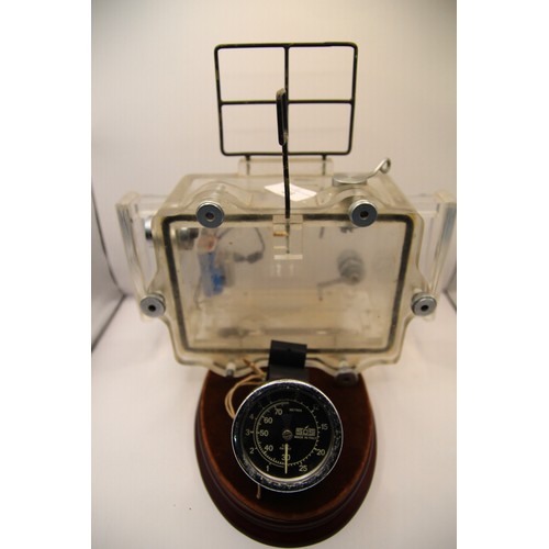 26 - A French wrist-worn diving gauge plus and underwater camera housing