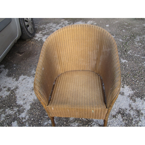 16 - A Lloyd loom casual chair in very good condition