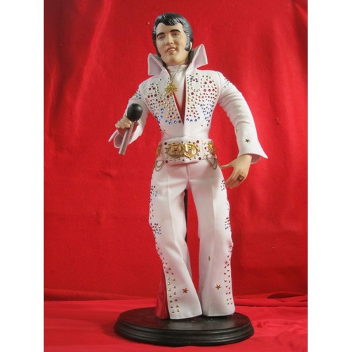 374 - Elvis Presley  eighteen inches tall on stand with microphone by Danbury mint.
Fully boxed with origi... 