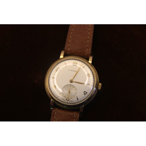 65 - Longines 9ct Gold gentleman's wristwatch in very nice condition and running order. 17 jewel mechanis... 