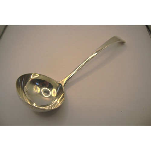 66 - A substantial ladle of sterling silver, of plain design with the monogram 'C' to the handle top, hal... 