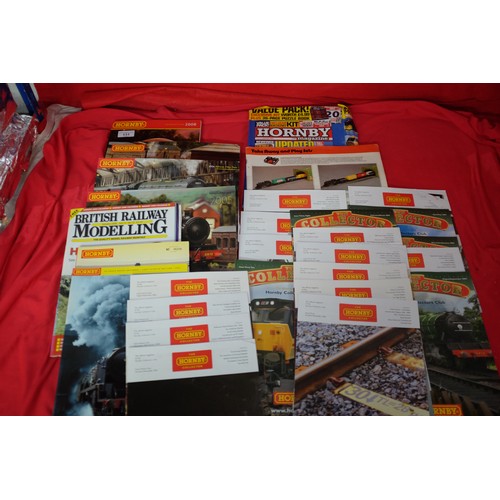 42 - A selection of Hornby Catalogues from the early 2000s along with collectors club magazines approx,20... 