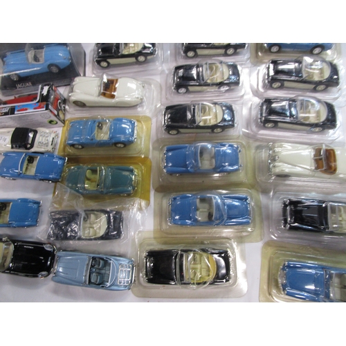 49 - Sixteen British sports cars in blister packs along six loose and two boxed cars all as per pictures ... 