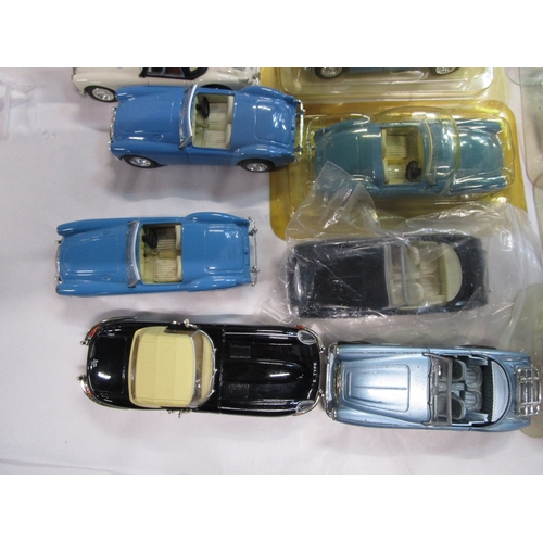 49 - Sixteen British sports cars in blister packs along six loose and two boxed cars all as per pictures ... 