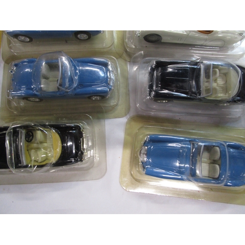 49 - Sixteen British sports cars in blister packs along six loose and two boxed cars all as per pictures ... 