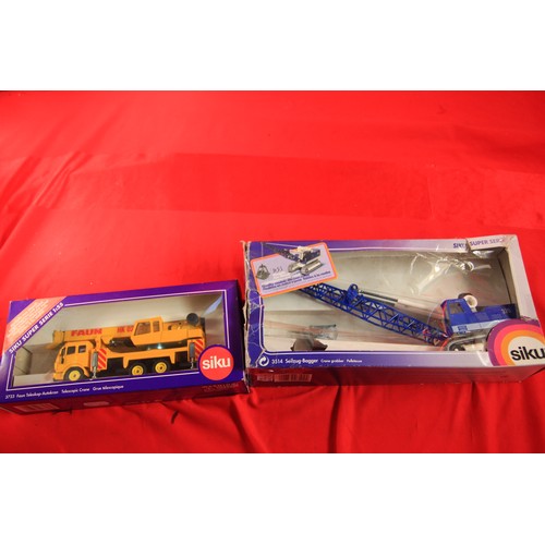 51 - A pair of boxed Siku Super Serie 1:55 scale die cast vehicles - #3723 Telescopic Crane and #3514 Cra... 