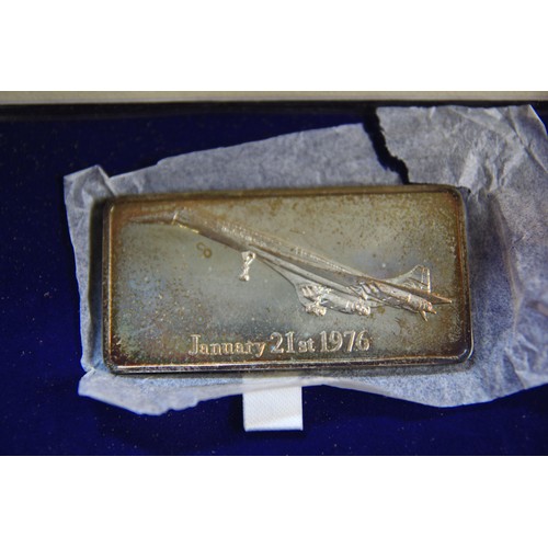 72 - A sterling silver ingot issued to mark the inaugural flights of Concorde on commercial service in or... 