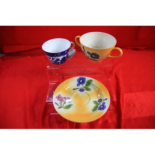70 - A poole pottery two handled drinking cup along with A royal Worcester tea cup in Blue white decorati... 