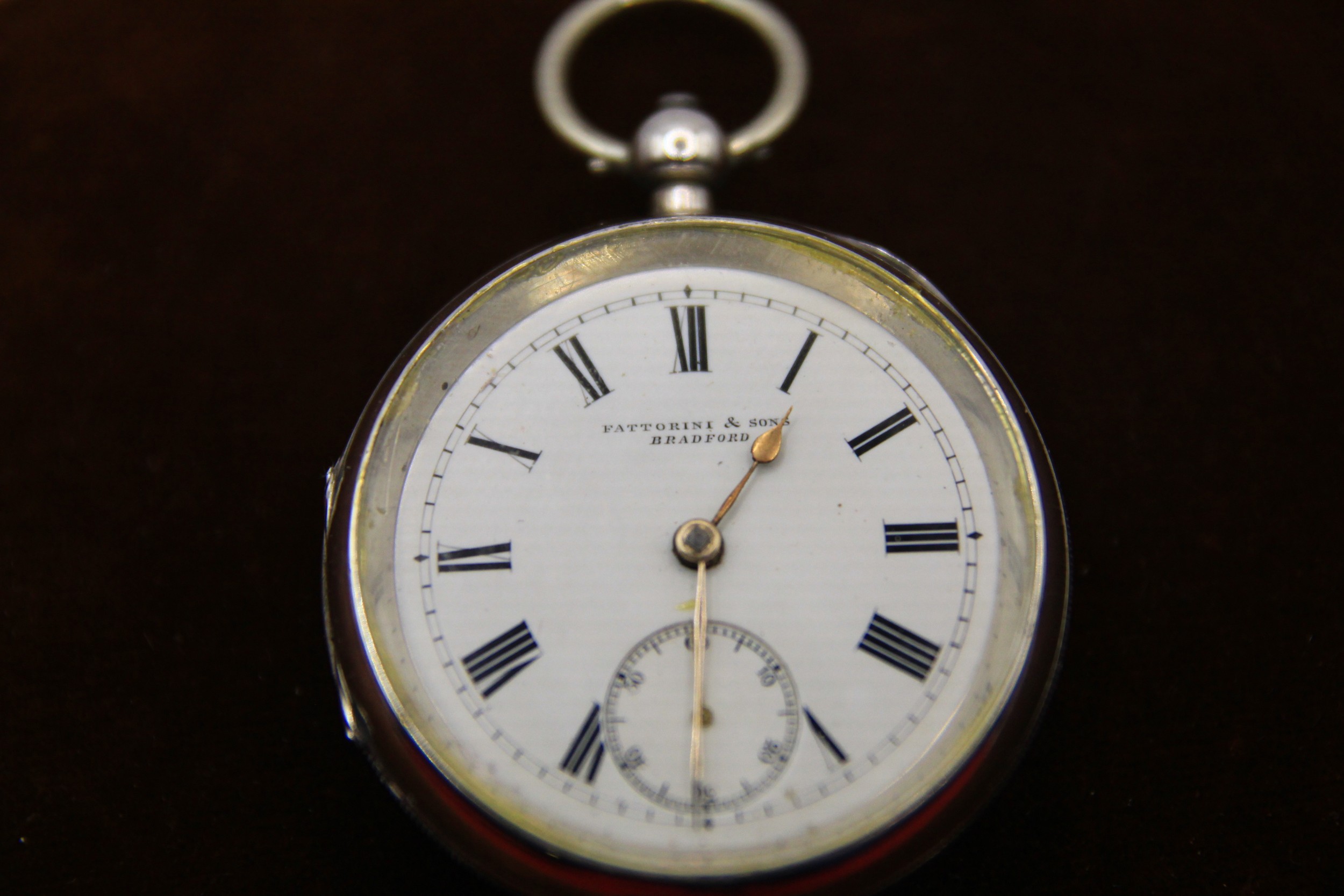 A Silver Pocket Watch marked for Fattorini & Sons of Bradford