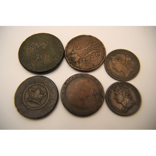50A - A selection of unusual coins comprising an 1844 3 kopek Russian coin, an 1832 Province of Nova Scoti... 