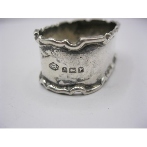 110 - A large sterling silver napkin ring hallmarked for Birmingham 1930 by Atkinson Brothers Ltd