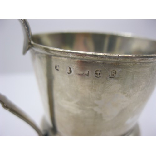 153 - A Georgian thistle shape silver christening mug with ornate strap handle hallmarked for Birmingham 1... 