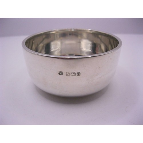 198 - A large, plain sterling silver bowl with thick rim, of heavy gauge, in excellent order, hallmarked f... 