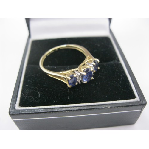 211 - A 10 carat gold blue stone ring marked TNL, approx weight 2.1g, size N/O