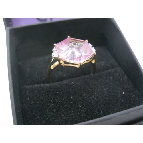 214 - A 9 carat gold faceted amethyst ring with diamond set shoulders, approx weight 2.9g, size Q