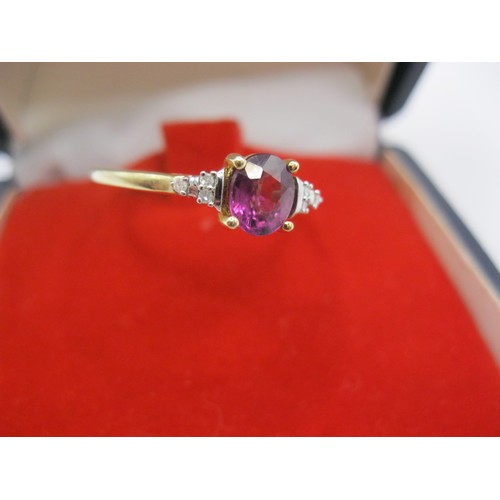 218 - A hallmarked 9 carat gold, amethyst and diamond ring, approx weight 1.6g, size Q