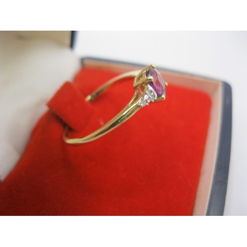 218 - A hallmarked 9 carat gold, amethyst and diamond ring, approx weight 1.6g, size Q