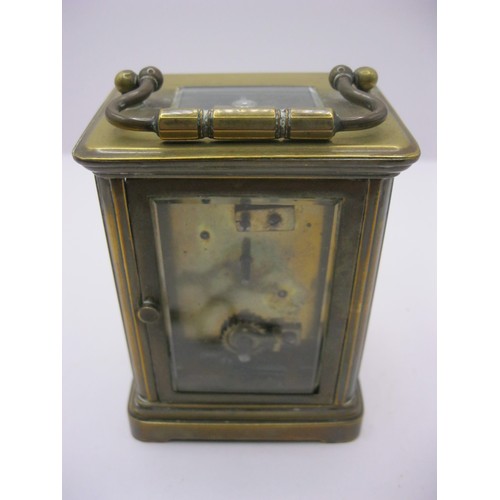 240 - A small brass carriage clock timepiece