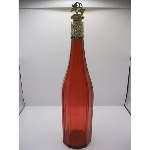 242 - A tall cranberry hock decanter with ornate silver grape patterned neck and similar stopper, hallmark... 