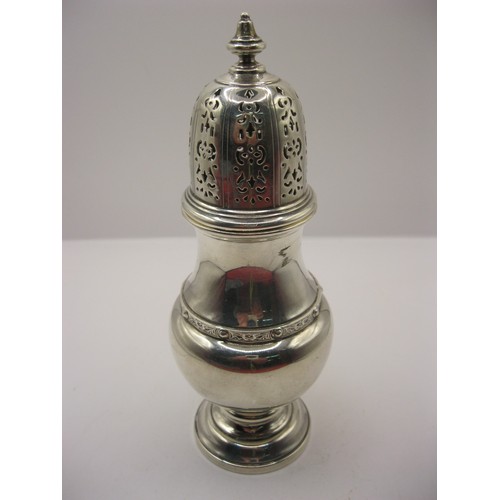 253 - A large sterling silver sugar castor with ornate pierced top and a celtic pattern band to waist, hal... 