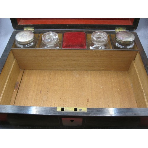 116 - A Victorian rosewood work box with velvet fitted interior, various jars and bottles and having a jew... 