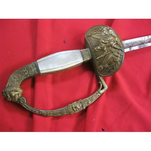 368 - An ornate continental sword with Mother-of-Pearl handle and ornate guard