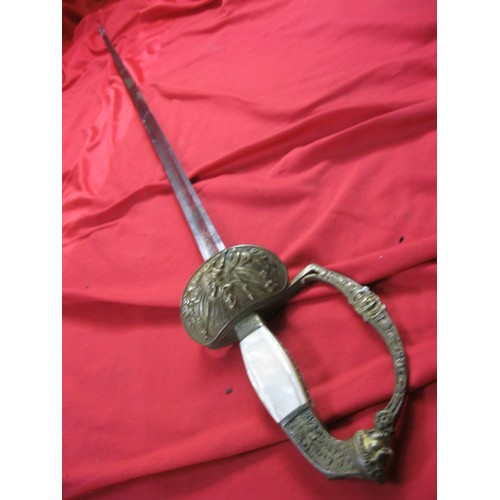 368 - An ornate continental sword with Mother-of-Pearl handle and ornate guard