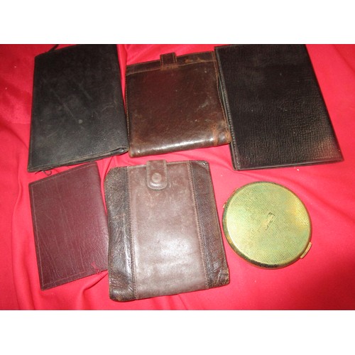 37 - A selection of Leather wallets including a French manufactured one along with a Stratton compact wit... 