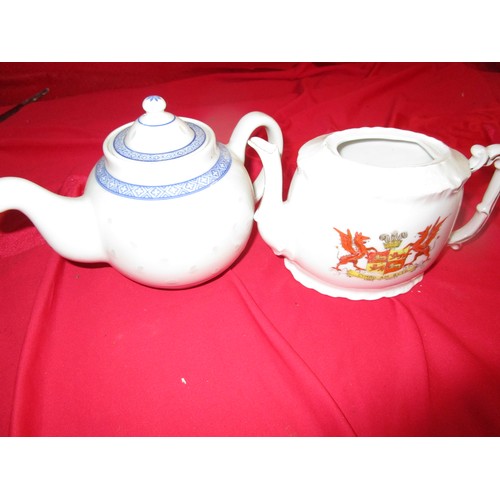 52 - Two teapots one crested with the welsh coat of arms and another blue banded version