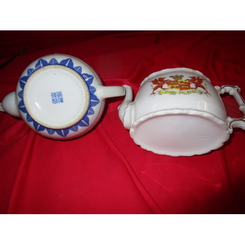 52 - Two teapots one crested with the welsh coat of arms and another blue banded version