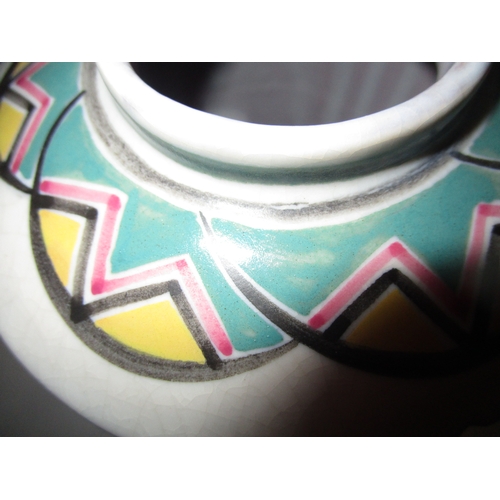 14B - A Poole pottery vase from the 1920s  with a raised tubular design and very well painted in the V Z p... 