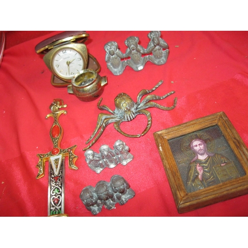 275 - A selection of metalwork and other items including 3 sets of brass monkeys, a paper knife and a reli... 