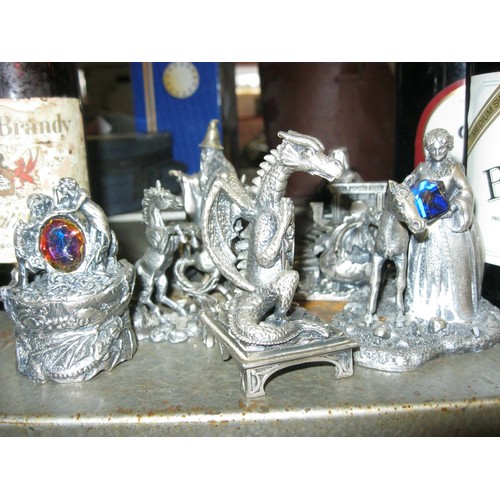 282 - A selection of pewter figurines Dragon and Arthurian characters.